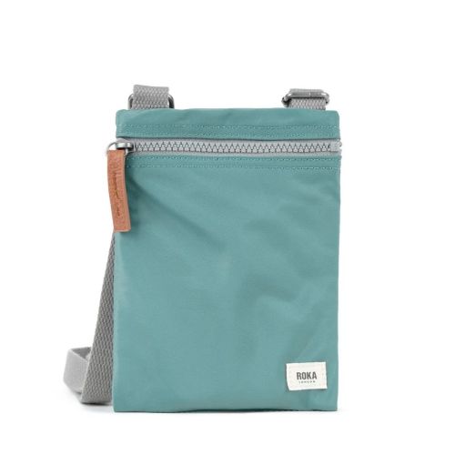 Roka Chelsea Sustainable Nylon Pocket Sling Bag Sage